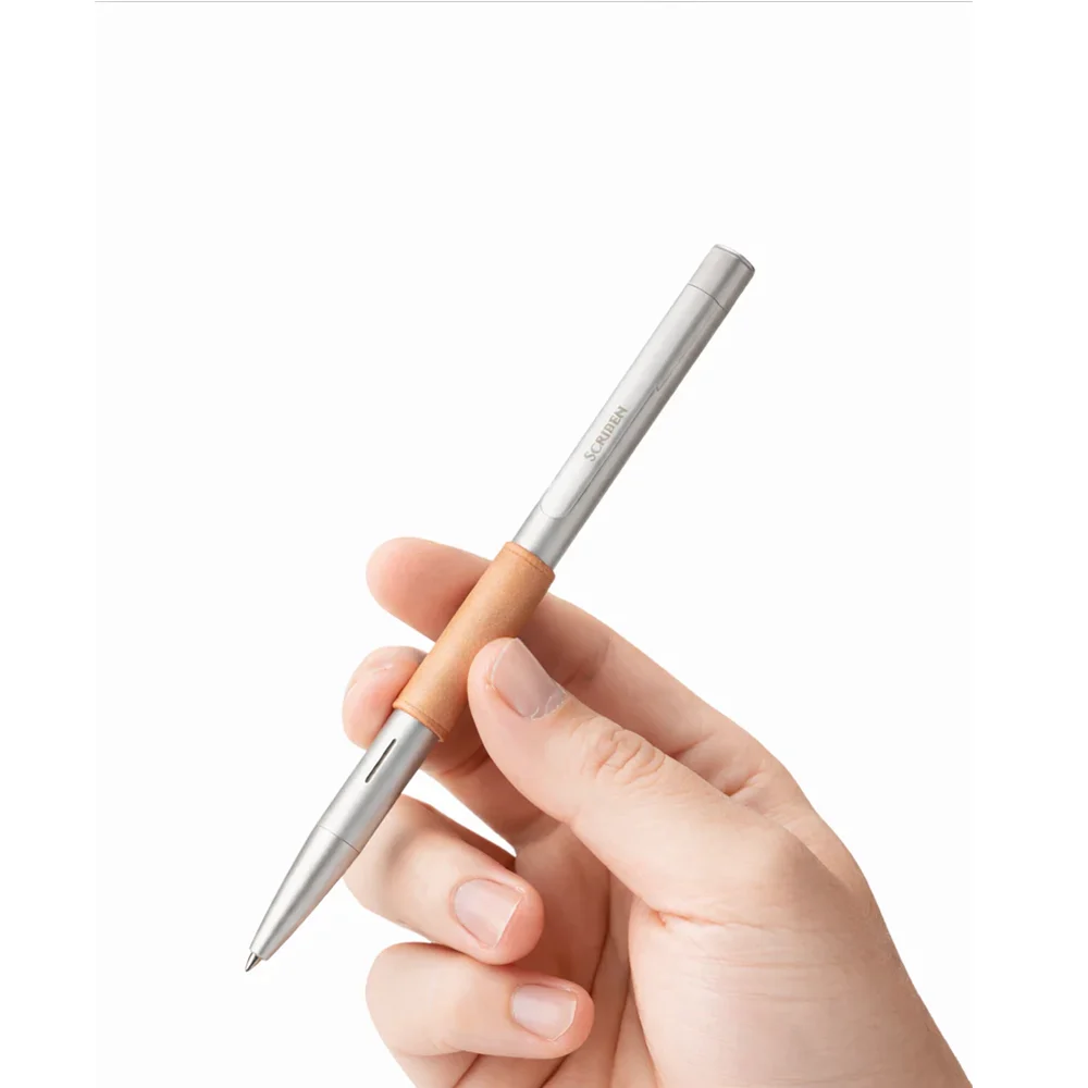 Scriben pen held in one hand