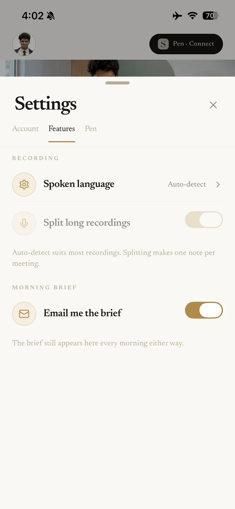 The Settings screen showing spoken language set to auto-detect and the option to split long recordings